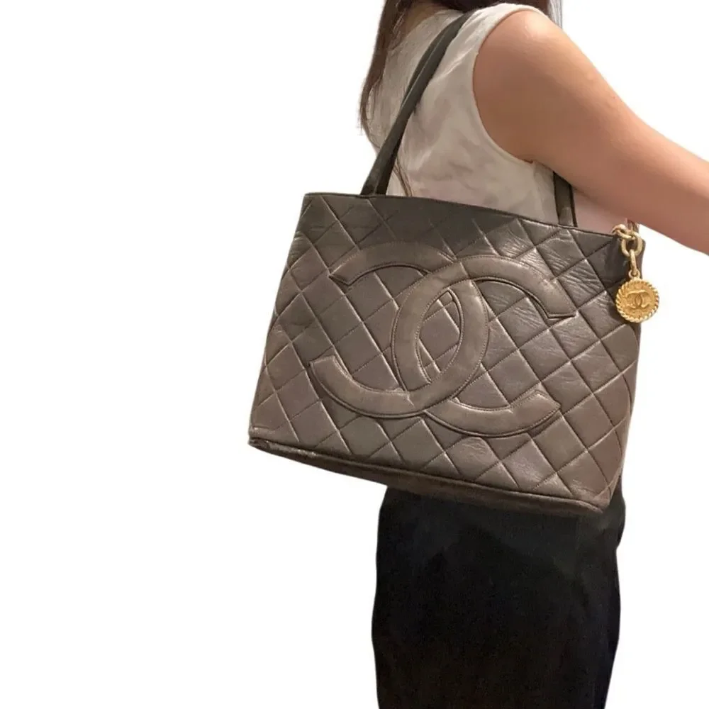CHANEL Brown Quilted Shoulder Bag with Gold Accents